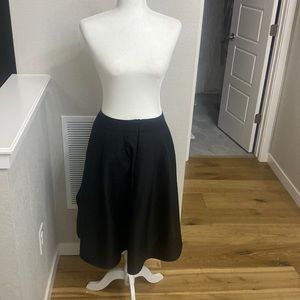 Pleated Face N Face skirt.